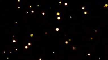 4k içinde alfa arkaplanda parlayan altın bokeh parçacıkları