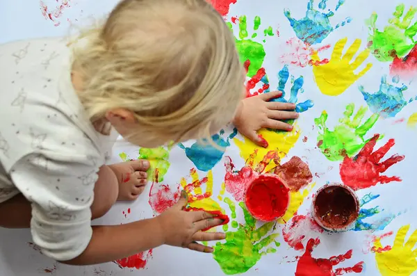 Little Girl Paints Nursey School White Background Multicolor Imprint Hands — Stock Photo, Image