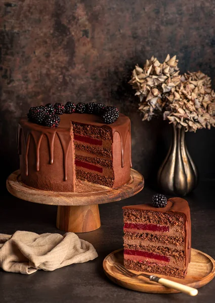 Food photography of chocolate cake, blackberries, cream, birthday, decoration, celebration, anniversary, party