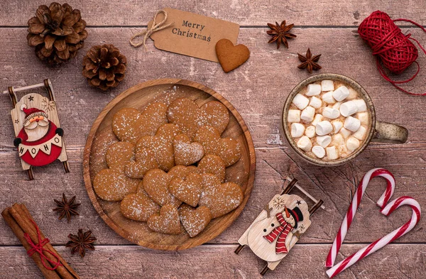 Food photography of gingerbread, cookies, biscuits, icing sugar, cooking, preparation, cinnamon, anise, background, christmas