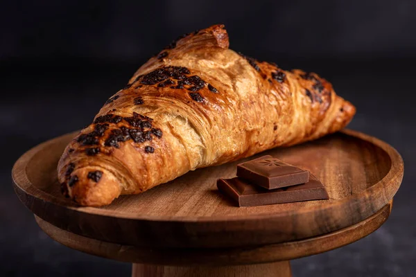 Macro food photography of croissant, chocolate