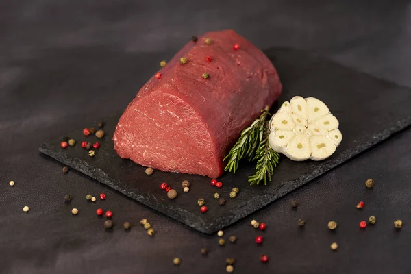 Food photography of raw beef, tenderloin, fillet, meat, sirloin, loin, steak, beefsteak, butchery