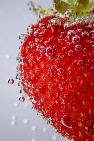 stock image Macro photography of Strawberry, bubbles, sparkling water, summer, soda, background