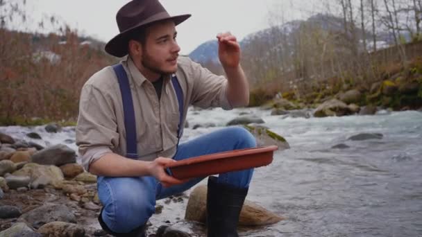 Disappointed Portrait Male Gold Digger Wash Gold Panning Mining — Video