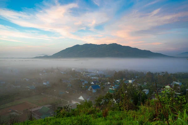 stock image Mountains during dawn. Beautiful natural landscape in the summer time. Beautiful sunrise in foggy mountains in Bao Loc, Vietnam