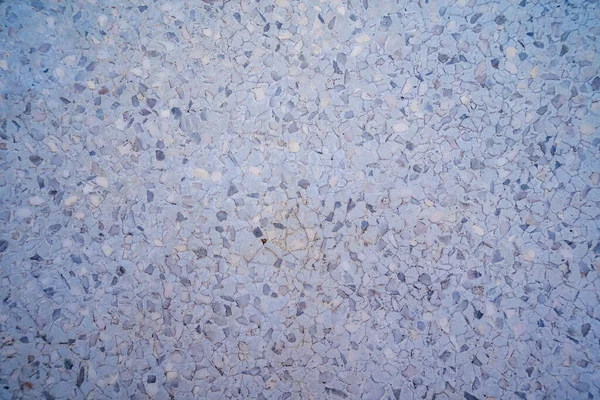 Terrazzo mermer döşemeli taş duvar dokusu soyut arkaplan. Beton yüzeyinde siyah beyaz terrazzo döşeme, mimari iç tasarım deseni, duvar kağıdı materyali modern ev dekorasyonu.