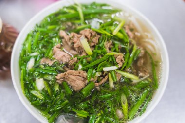 Sığır etli pho bo çorbası, Pho bo Vietnam yemeği, dilimlenmiş biftekli pilav çorbası. Vietnam usulü taze pirinç çorbası ve sığır eti. Vietnam 'ın ulusal yemeği