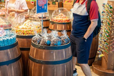 Singapore - Jun 13 2024: Candy shop in Bugis street Singapore. Travel concept clipart