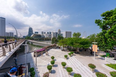 Singapore - Jun 13 2024: View of Marina Bay Sands in Singapore. City landscape at day blue sky. Travel concept clipart