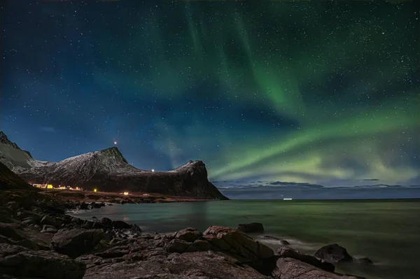 northern lights over the sea in the night