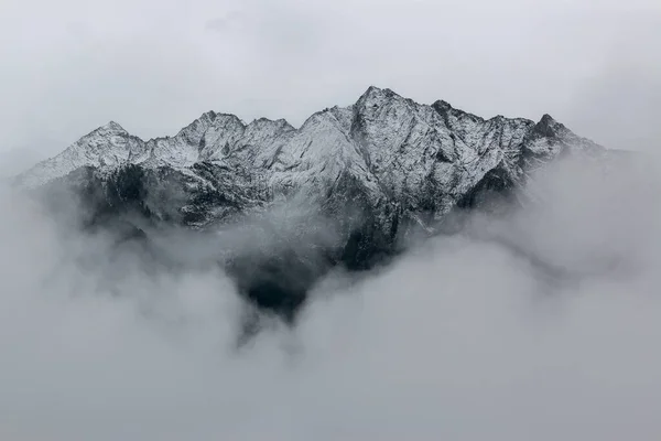beautiful mountains landscape in the fog