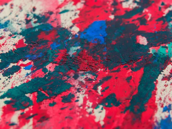 abstract background of acrylic paint in red and blue colors