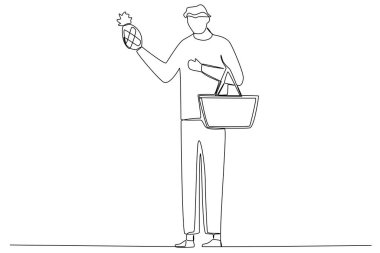 Alışveriş çantası taşıyan bir adam.