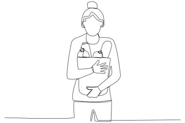 Alışveriş çantası taşıyan bir adam.