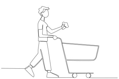 Alışveriş çantası taşıyan bir adam.