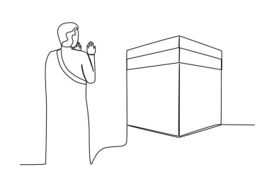 Bir kadın kutsal yolculuğu yapıyor. Hac ziyaretçileri tek sıra halinde...