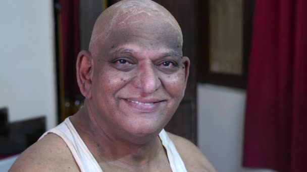 Video Close Portrait Indian Old Man Shaved Head Smiling Camera — Stock Video