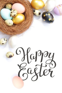 Bright easter eggs with happy Easter lettering, holiday concept. Selective focus.