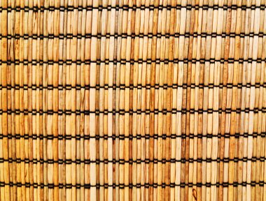 Bambudan örülmüş bir saman yüzeyi, doğal renklerde ekolojik halı ya da yemek servisi için, tencerenin altı ya da tabağın altı için kullanılır. Ekolojik materyal geri dönüştürülebilir. Eski kuru saman 