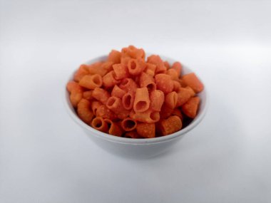 macaroni in wooden bowl on white background.