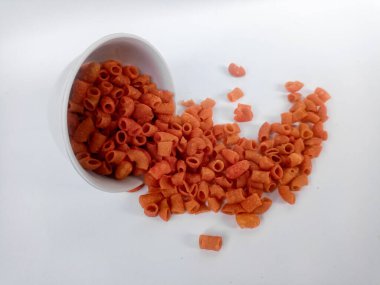 macaroni in wooden bowl on white background.