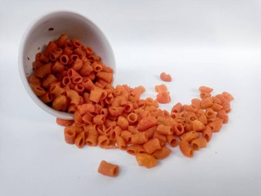macaroni in wooden bowl on white background.