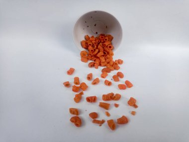 macaroni in wooden bowl on white background.