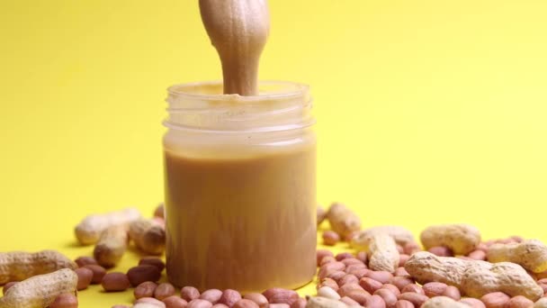 Manteiga Amendoim Amendoim Cru Fundo Colorido Foto Alta Qualidade — Vídeo de Stock