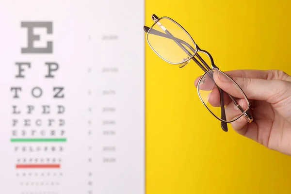 Vision Correction Glasses Hand Background Vision Test Table Space Text — Stock Photo, Image
