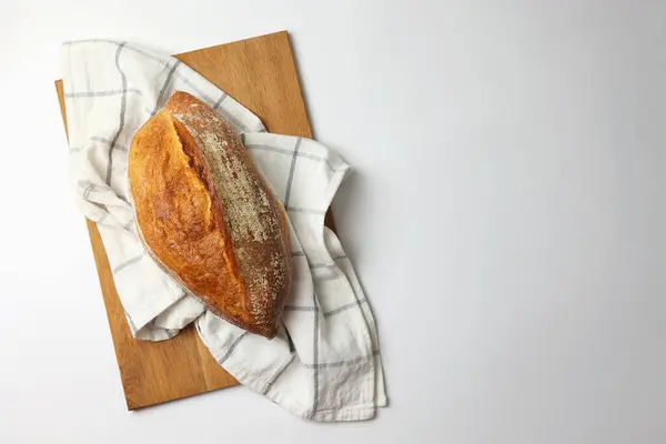 Güzel ve lezzetli bir zanaatkar ekmeği arka planda, üst manzara. Yüksek kalite fotoğraf