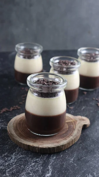 chocolate pudding with vla served in a cute pudding bottle, perfect for dessert.
