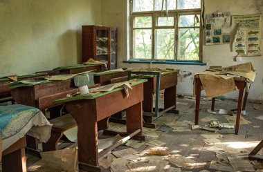 Ukraine, Krasno - 2017, 20 August: Ukraine, Krasno - 2017, 20 August: abandoned school in Krasno, small village located in Chernobyl exclusion area in Ukraine clipart