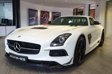MILTON KEYNES, ENGLAND - AUGUST 23,2016. Mercedes SLS GT3 AMG version at Mercedes-Benz Head office in UK clipart