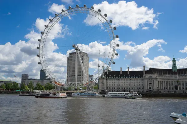 stock image LONDON,ENGLAND - JULY 3,2016. London Eye with beautiful blue sky