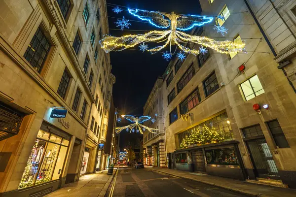 stock image LONDON, UK - DECEMBER 12, 2016: Christmas lights on Jermyn Street with T-M Lewin and Waterstones stores