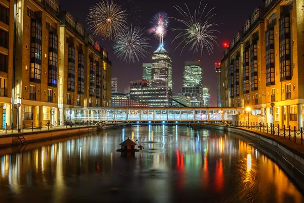 Stock image Canary Wharf business district at night with firework, celebration of the New Year in London, UK