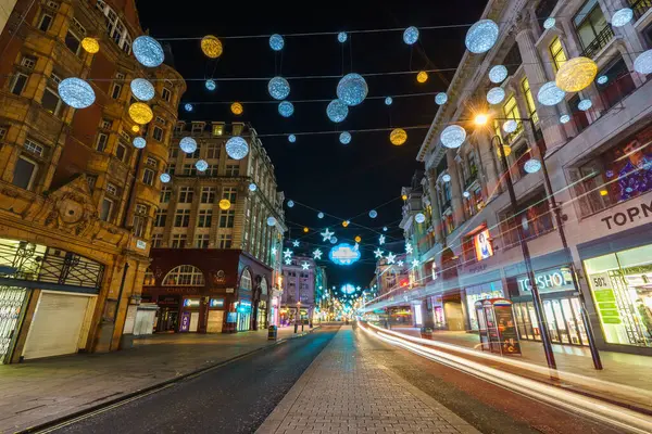 stock image LONDON,ENGLAND - DECEMBER 16,2016: Oxford street with lightrails and Christmas lights