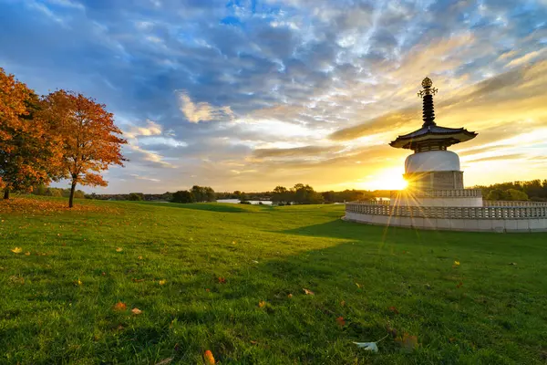 stock image Peace Pagoda temple at sunrise in Willen Park, Milton Keynes, UK