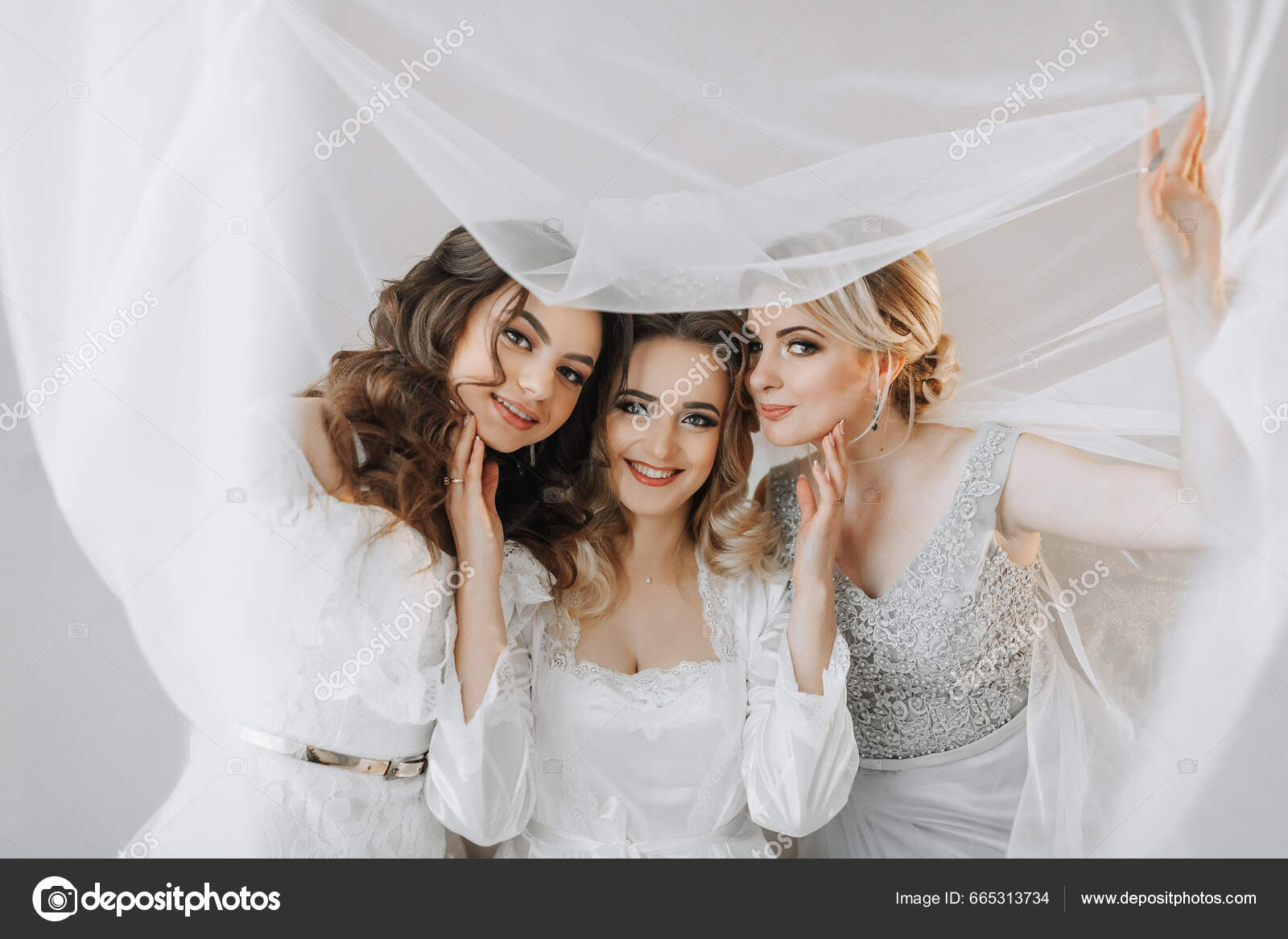 https://st5.depositphotos.com/77483880/66531/i/1600/depositphotos_665313734-stock-photo-bridesmaids-looking-camera-all-bride.jpg