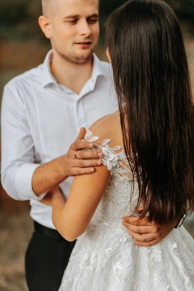 Groom Hugs Bride Shoulders Close Hands — Stock Photo, Image