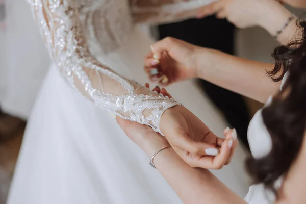 Wedding Morning Bridesmaids Help Put White Wedding Dress Young Woman — Stock Photo, Image