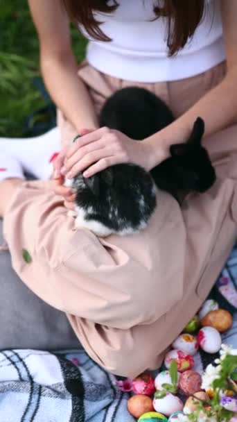 Girl Holding Little Bunny Adorable Black White Rabbit Sits Lap — Stock Video