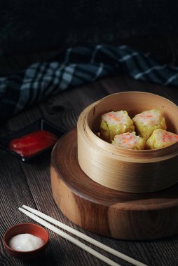 Bambu tenceresinde servis edilen ev yapımı Çin Dim Sum 'u.