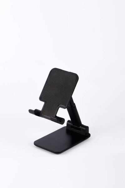 Black mobile phone holder porteble isolated on white background