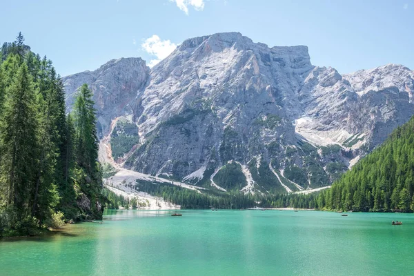 stock image Lake Braies (also known as Pragser Wildsee or Lago di Braies) in Dolomites Mountains, Sudtirol, Italy. Romantic place with typical wooden boats on the alpine lake. Hiking travel and adventure.