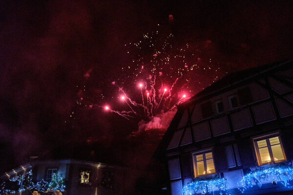 Alsace-December: night view of Ribeauville with fireworks