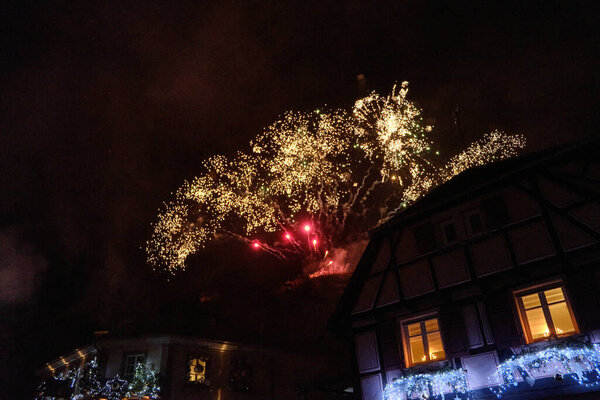 Alsace-December: night view of Ribeauville with fireworks