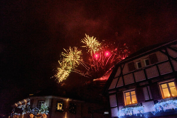 Alsace-December: night view of Ribeauville with fireworks