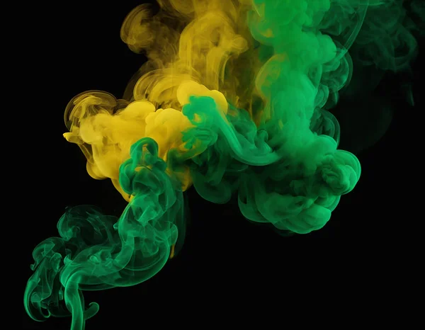 Abstract red, blue and green paint splash isolated light green paint dissolves in background, like a cloud or smoke background