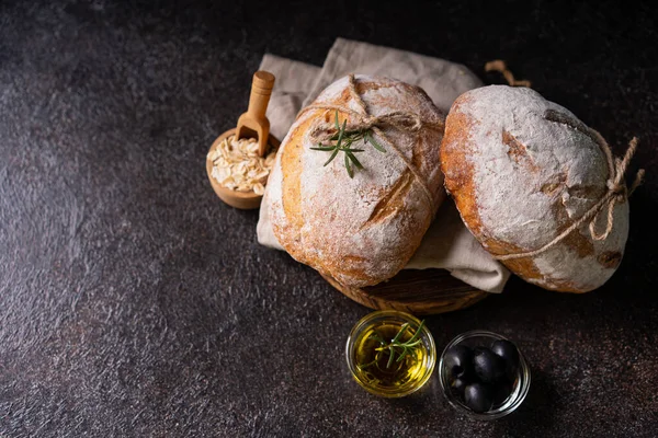 Freshly Baked Sourdough Ciabatta Bread Olives Rosemary Black Rustic Table — Stock Photo, Image
